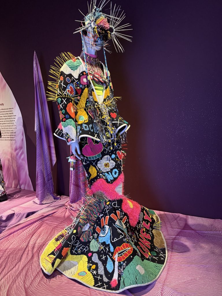 A dramatically colourful full body dress.